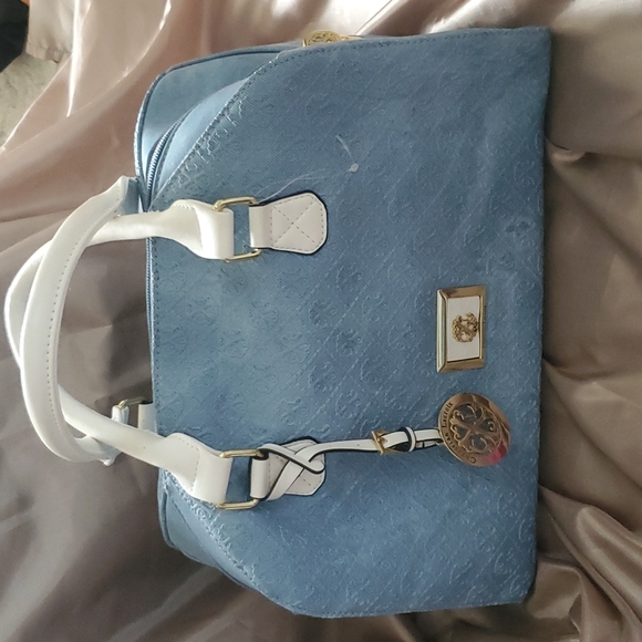 Christian Lacroix Handbags - ❌️ON HOLD❌NWOT Christian Lacroix Powder Blue bag with shoulder strap and dustbag